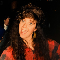 A photo from our younger days, Val at a party... bringing that beautiful smile!
