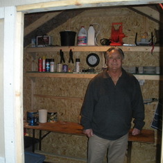 Vaughn is so proud of the storage shed that he built on his property at Lake Tyee