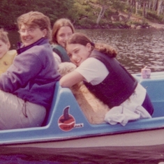 In the paddleboat with her grandchildren Tanner, Maria, and Michelle