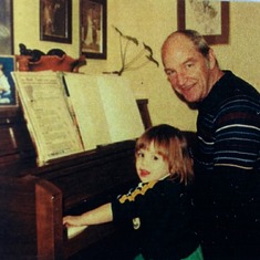Playing piano with Grandpa.
