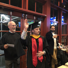 Vic celebrating grandson Zander's graduation with grandson Jared Smith