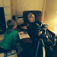 Ashton talking to Grandpa at Thanksgiving, 2014.