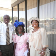 At her Thanksgiving with Mrs. Okeke and Nwora Onwuzulu
