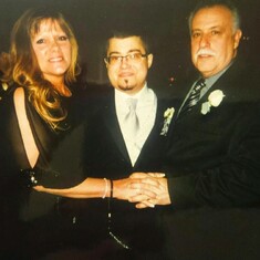 You were so proud.. with mom and dad ..just made Dan's wedding