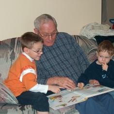 Papa reading to Brendan & Mathieu