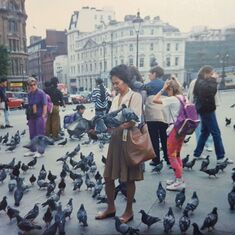 Violet feeding the birds in trafalgar square (90s)