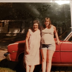 Me and mommom standing by my first car she got for me when I was 17