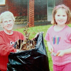 Sharing her love of gardening with her granddaughter