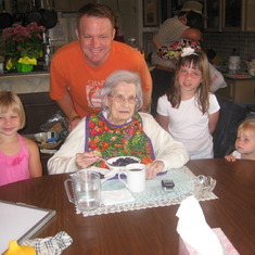 This is from May 2011.  The Mike Howards were moving from California to Little Rock and Corpus is obviously on the way. Left to Right is Ella, Mike, Grandma, Abby, and Anna.  In the background is Phil and Carole in a standard bear hug.  Grandma is eating 