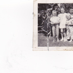 Teed kids.. From left to right, Wally, Lois, and the little blondie in front our little sister Jan and the other two boys are our uncle Fords sons, John and Bob Teed..  Wally, age 5, Lois 7 and Jan 3