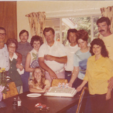 Wally in the center, earlier and obviously happy days. Jack and Barb Fiskum on right, was their house warming. On extreme left our moma and her then husband, Ernie, he is Jack's dad. Jack and Barb have passed and so has our moma and Ernie.