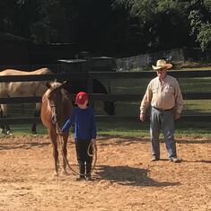 2019 - Skip teaching his grandson horsemanship 