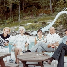 L to R: Arlie's stepmom Lillian, Arlie's Grandma Clara, Arlie, Arlie's father Jack, and Walter enjoying themselves on the back deck.