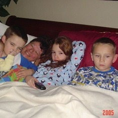 Snuggling in bed with the Turnbull grandkids