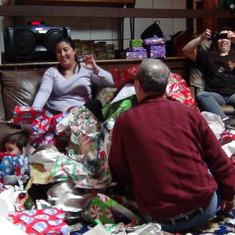 2014 (Potomac, MD): Warren, Carla, Christie, Conner, Wayde in Christmas chaos.