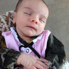 Baby Meadow, 2 weeks old, wearing camo for Grandpa