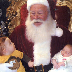 Race Walters and Marley Clausen with Santa