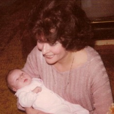 Mom with her first granddaughter, Kelly, 1980