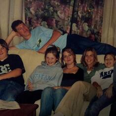 Billy M., Amy, Jen, Meg, Amanda, Grace and Bill C on top of couch