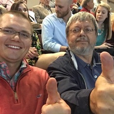 Jakes graduation, brother & Dad giving him a thumbs up