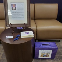 Memorial to Charlie set up at the entrance to the Economics Department