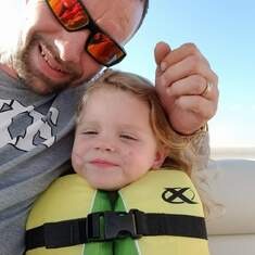Daddy and Paisley on the boat