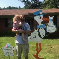 Daddy and Paisley with the stork for our new son