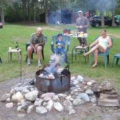 Up North with dad always involved a campfire!  Bill, Alex, Justin, Tricia (Amy behind the camera...)