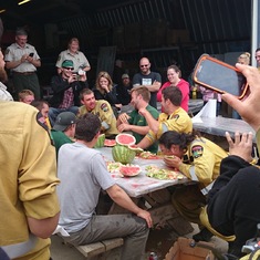 Water melon eating comp. at LLB forestry base with Group 9. Will is enjoying Jarretts valiant but futile attempt to eat the most melons.