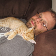 The softy side of Will, cuddling with a cute little rescue kitten!