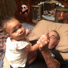 Him and one of great grandbaby's lilly my favorite picture