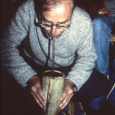 Bill Drinking a Nepali Concoction 1980