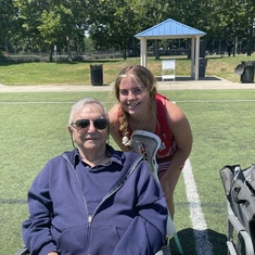 Enjoying Averie’s La Crosse game (Granddaughter)