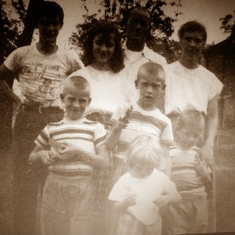 My dads family pic on the farm him and his brothers & sisters and mom & Dad