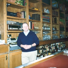 1990: Bill at his "Bookcase Bar," 1892 in Council Bluffs, IA