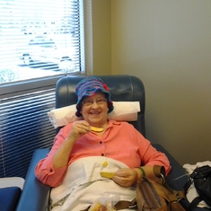A cozy hat and a tasty snack at chemo