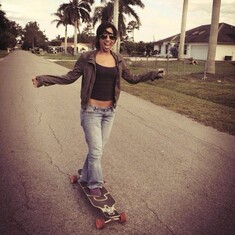 Gigi skateboarding which she loved
