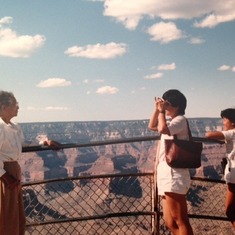 Mom taking a photo of her camera-shy mother and Helen looking on at the Grand Canyon