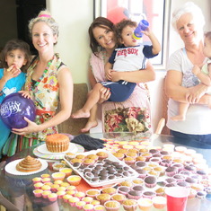 Baked 100 cupcakes for Isabella's first Birthday. Audrina, me, Justina, Cousin Victor, Grammy and Isabella.
