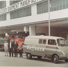 Dad and his partners in front of their garment factory in Hong Kong.