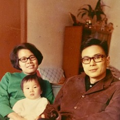 Dad, Mom, and Pauline, at Grandpa's home, photo taken by Grandpa