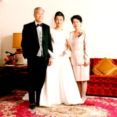 Dad, Mom, Peg on Peg's wedding day.