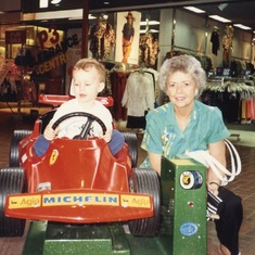 Gramma and Grandson and a shared love of cars.  Gramma would have preferred a Hummer!