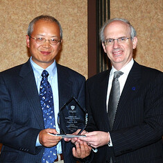 Dr. ZiJian Xie receives the Award for Sustained Research from Dr. Jeffrey Gold, Dean of the College， 2008