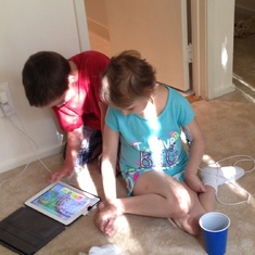During her trip to Johns Hopkins, which her stepfather arranged -she and her step brother,Duncan, playing  her favorite iPad “Game of Life.”