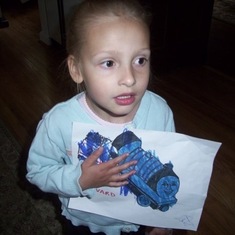 Zoe wit her colored Edward from Thomas the Tank Engine