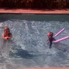 Swimming at her Aunt and Uncle’s in Florida with her cousin Maddie and her brother Ethan